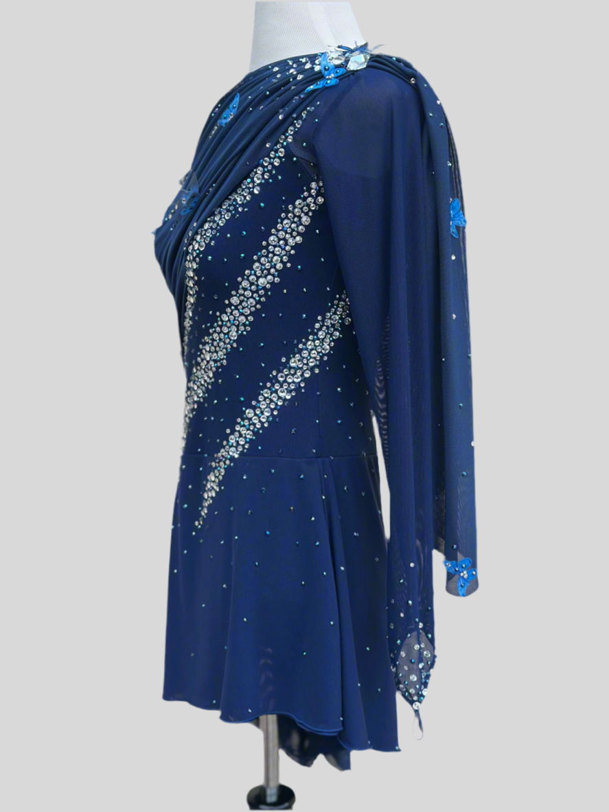 Elegant butterfly figure skating dress in deep blue with crystals, dra –  Errian Design Icewear